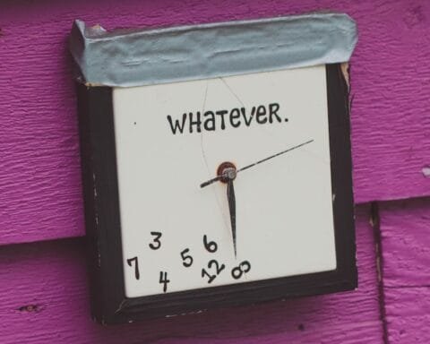 a clock that is on the side of a building