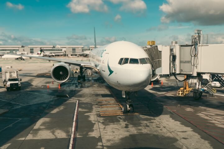 a large jetliner sitting on top of an airport tarmac