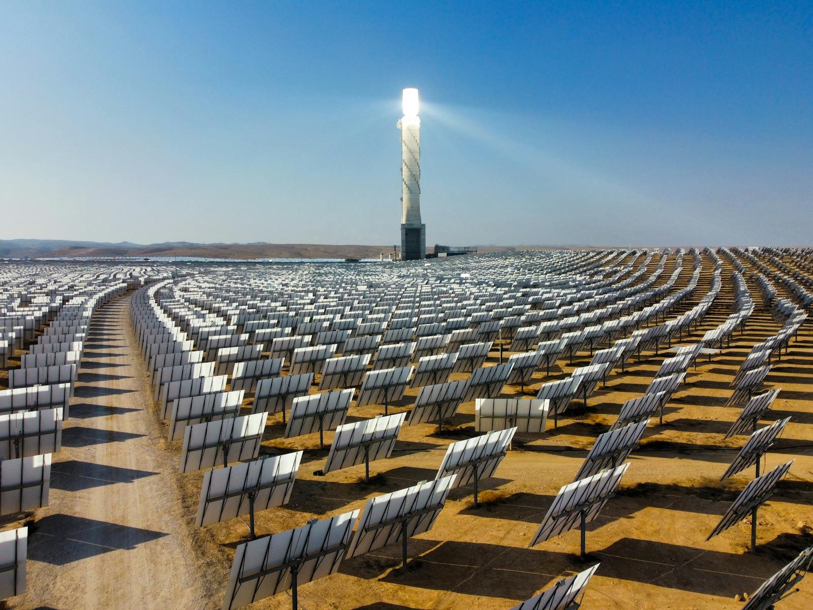 Vast array of solar panels at Ashalim Solar Plant in Israel's Negev Desert, showcasing clean energy.